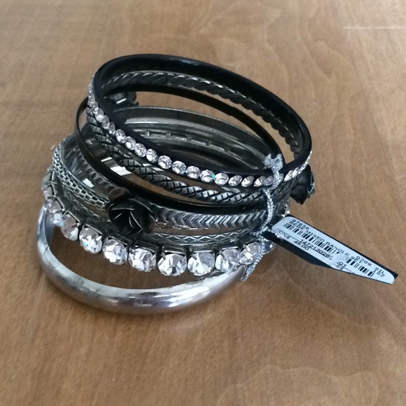 bebe Jewelry - Bebe 8 piece crystal and silver bangle set